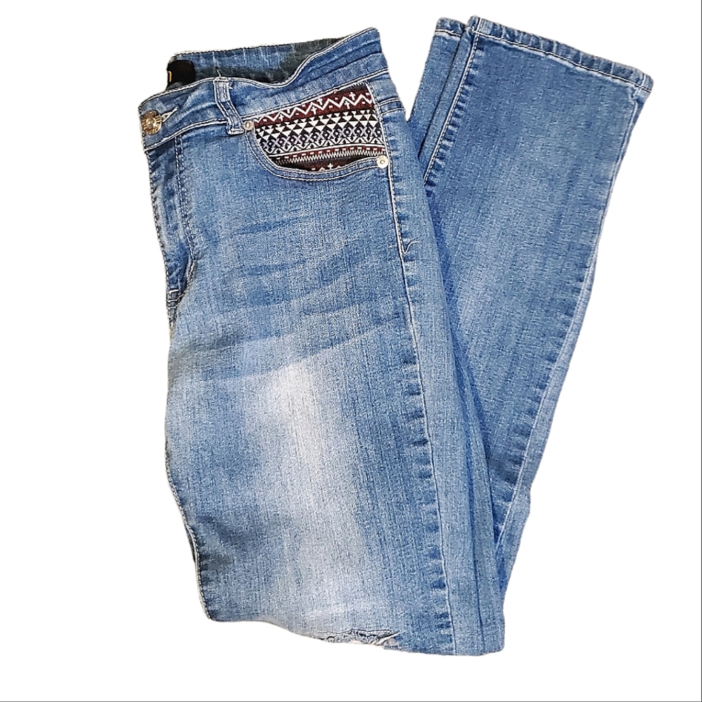 DKIN | Women's blue washed denim patch distressed jeans.